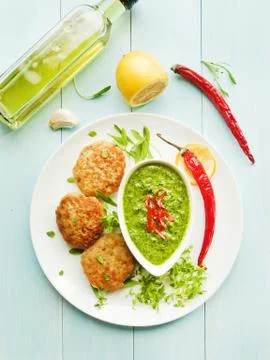 Cutlets and sauce Stock Photos