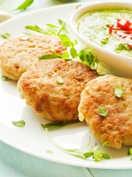 Cutlets and sauce Stock Photos