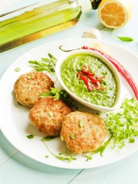 Cutlets and sauce Stock Photos