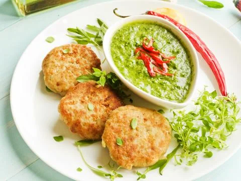 Cutlets and sauce Stock Photos