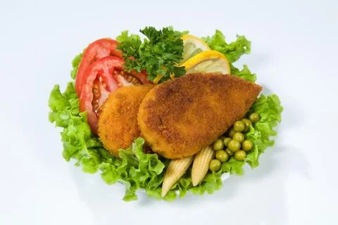 Cutlets And Vegetables Stock Photos