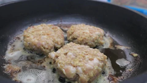 Cutlets are fried in a frying pan Video stock 145712358