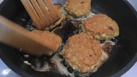 Cutlets are fried in a frying pan Video stock 145926437