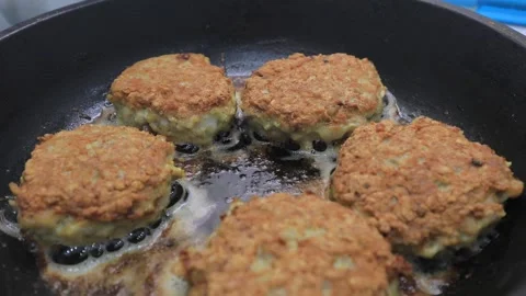 Cutlets are fried in a frying pan Video stock 145977523