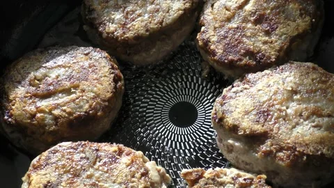 Cutlets are fried in a pan Stock Footage 161704165