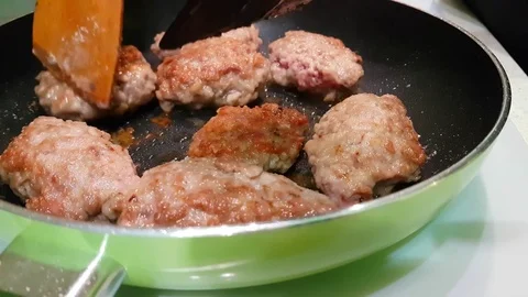 Cutlets are fried in a skillet Stock Footage 80880027