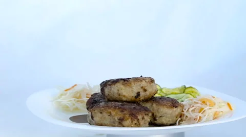 Cutlets with cabbage and zucchini Stock Footage 61913214