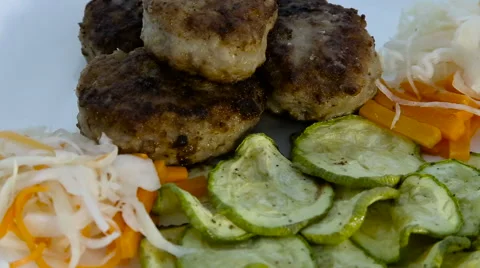 Cutlets with cabbage and zucchini Stock Footage 61916146