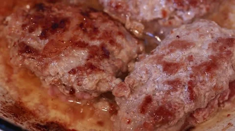 Cutlets fried in a frying pan Stock Footage 49918950