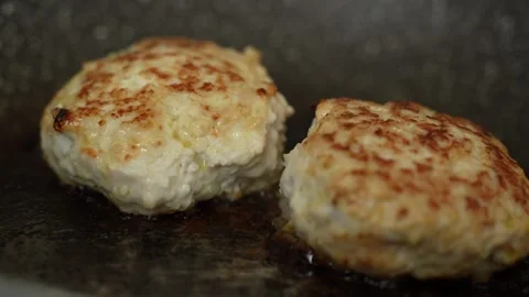 Cutlets fried in a frying pan Stock Footage 267706710