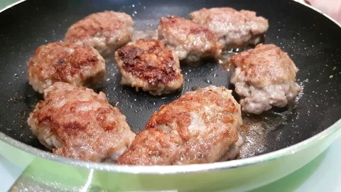 Cutlets fried in a pan Stock Footage 80880003
