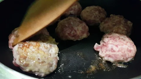 Cutlets fried in a pan Stock Footage 89247597