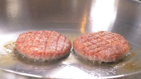Cutlets fried in a pan Stock Footage 122834162