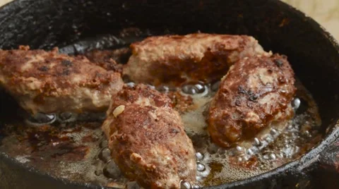 Cutlets From Minced Meat Removed From the Frying Pan With Boiling Oil Stock Footage 61519818