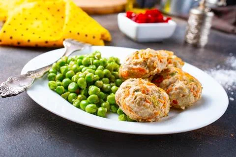 Cutlets with peas Stock Photos