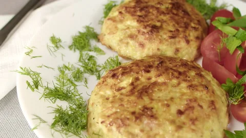 Cutlets on platter dill and cherry tomatoes Stockbeeldmateriaal 162108087