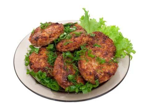 Cutlets on salad leaves Stock Photos