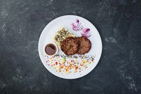 Cutlets from veal with mashed potatoes. Stock Photos