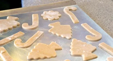 Cutout cookies on a sheet Stock Photos