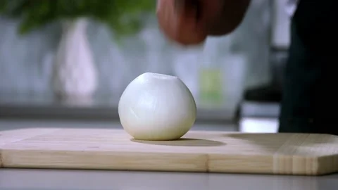 Cuts onions slow motion Stock Footage 236206688