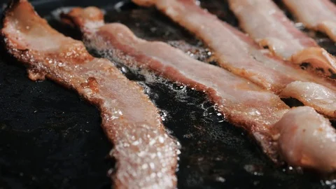 Cuts of pork on the hot pan, camera slide movement Stock-Footage 102569720