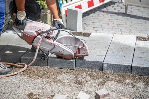 Cuts a tile Stock Photos