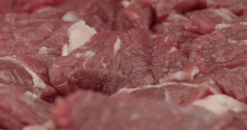 Cutted beef meat closeup rotating selective focus Stock Footage 154508919