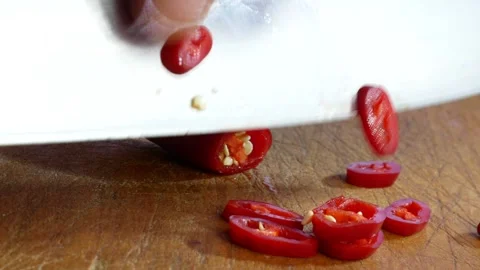 Cutted Spicy chilli pepper on cutting board 스톡 동영상 242085171