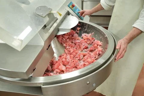 Cutter for chopping meat at a meat processing plant. Industrial cutter at the Stock Photos