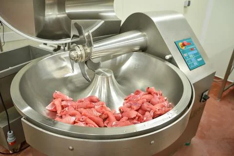 Cutter for chopping meat at a meat processing plant. Industrial cutter at the Stock Photos
