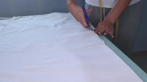 The cutter cuts the fabric. Stock Footage 138141371