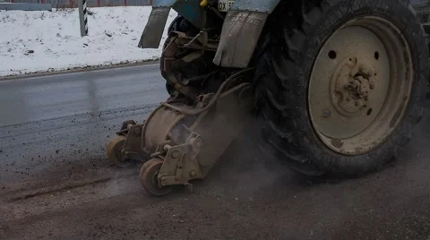 Cutter cuts the old asphalt Stock Footage 56291132