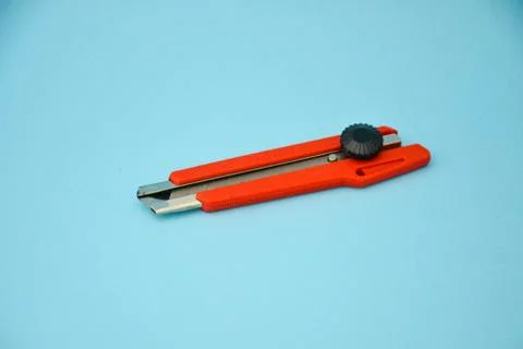 Cutter Isolated on Blue Background. Foto stock