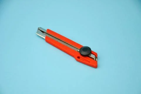 Cutter Isolated on Blue Background. Stock Photos