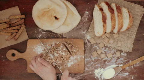 Cutting and checking bread Stock Footage 62528603
