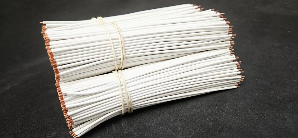 Cutting and decapping of electrical cable Stock Photos