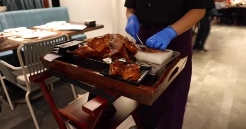 Cutting and Dressing of Peking Roast Duck in restaurant, a famous dish that h Stock Footage 170738544