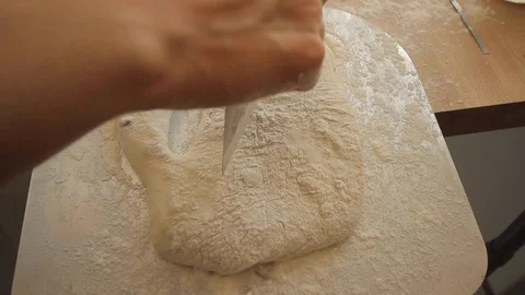 Cutting and marking bread dough 스톡 동영상 130040307
