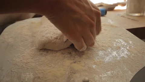 Cutting and marking bread before putting it in the oven Stock Footage 130040797