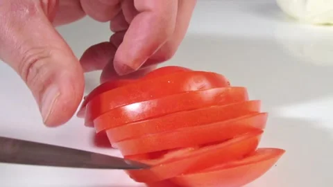 Cutting and Mozzarella Tomato with Knife in Slices - 50FPS Stock Footage 277353280
