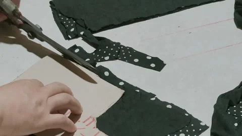 Cutting and Preparing Dark Green Material for Sewing Stock Footage 295286425