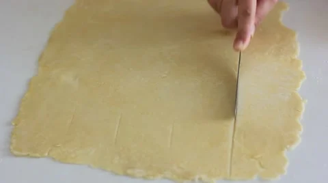 Cutting and slicing the dough Stock Footage 42693456