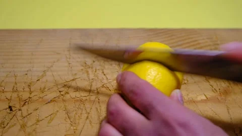 Cutting and slicing of a lemon Stock Footage 154203011