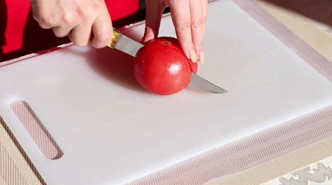 Cutting and slicing tomatoes Stock Footage 50886050