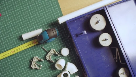 Cutting and welding devices and pvc pipes on the table Stock Footage 102655898