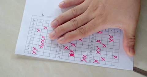 Cutting answer sheets to prepare for student exam checking after final exams. Stock Footage 317756979