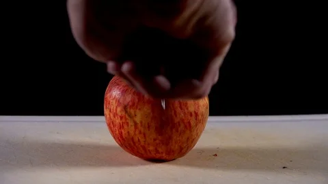 Cutting an apple Stock Footage 98680706