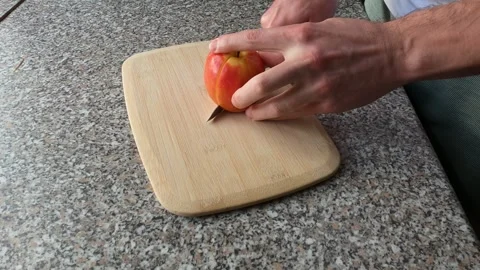 Cutting the Apple Video stock 330900459