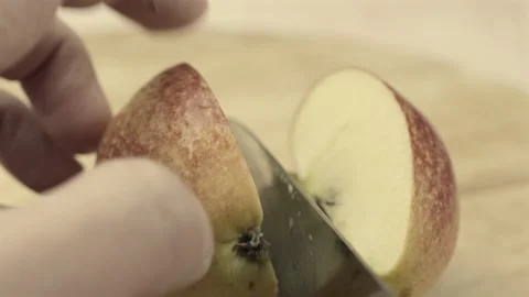 Cutting An Apple In Half With A Kitchen Knife. Vídeos de archivo 277325209