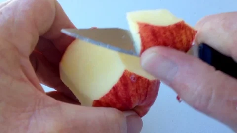 Cutting An Apple By Hand Stock Footage 75020011